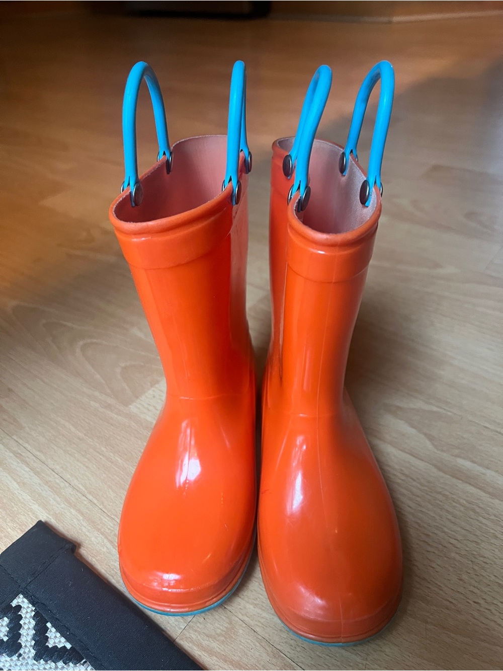 Kids Orange Rain Boots with Blue Handles, size 8